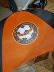 Umbrellas with club crest on