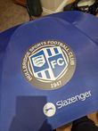 Umbrellas with club crest on